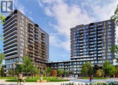 Two modern apartment buildings with balconies and a park in front.