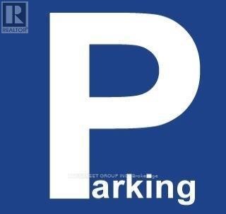 A blue and white sign with the letter P on it.