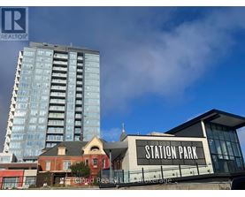 A modern building with the words "STATION PARK" on it.