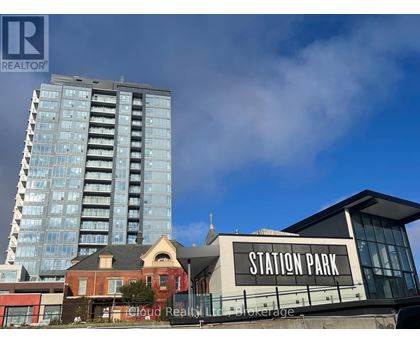 A modern building with the words "STATION PARK" on it.