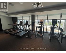 A gym with treadmills and exercise bikes.