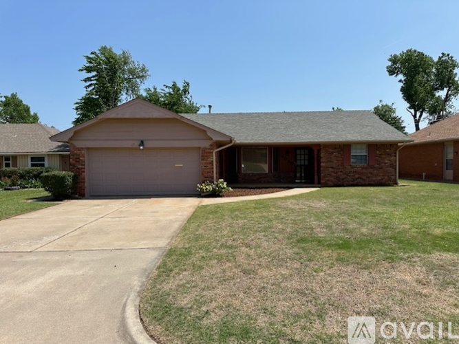 A house with a driveway in front of it.