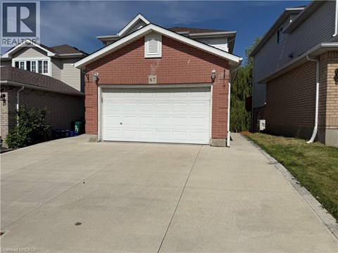 A garage with the number 67 on it.