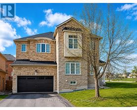 A large house with a garage is for sale.