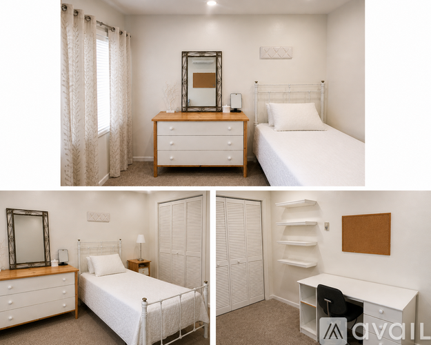 A bedroom with a bed, dresser, and mirror.