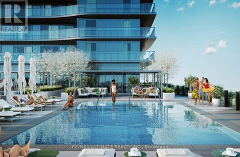 A group of people are enjoying the sun by a pool.
