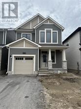 A house with a Realty logo in the corner.