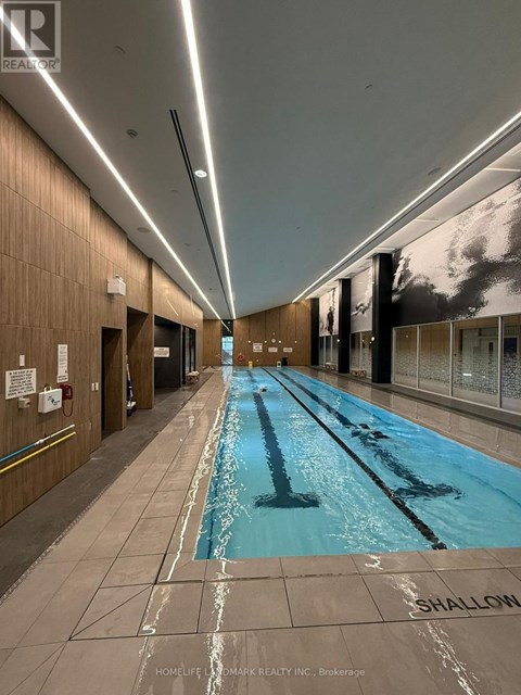 A long rectangular pool with the word shallow written on the floor.