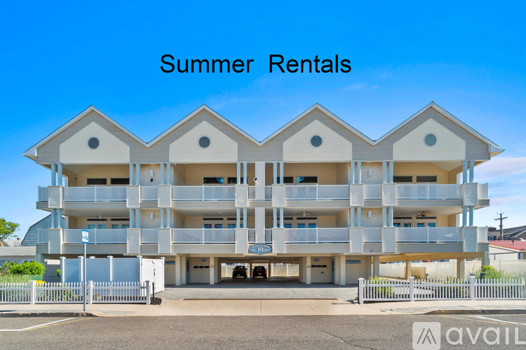 A large apartment complex is advertising summer rentals.