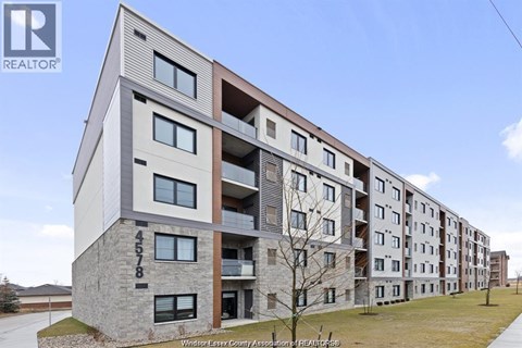 A modern apartment building with the number 4578 on the front.