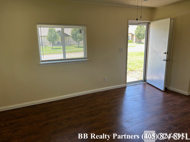 A room with a window and a door is on the market with BB Realty Partners.