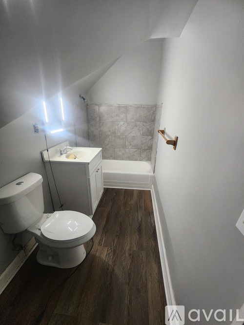 A small bathroom with a toilet and a sink.