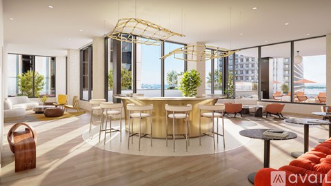 A modern living room with a large table and chairs.