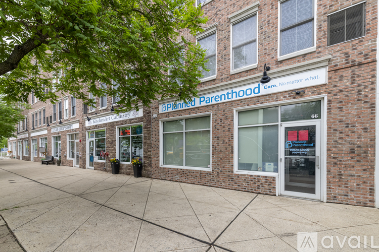 A Planned Parenthood clinic is located in a brick building on a city street.