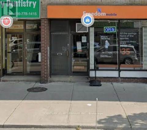 A building with a sign that says Freedom Mobile.