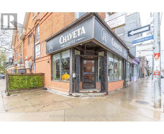 A brick building with a sign that says Chaveta Coffee.