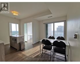 A dining room with a table and chairs is shown.