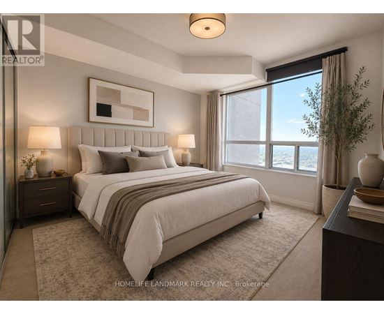 A well-lit bedroom with a large bed and a view of the city.