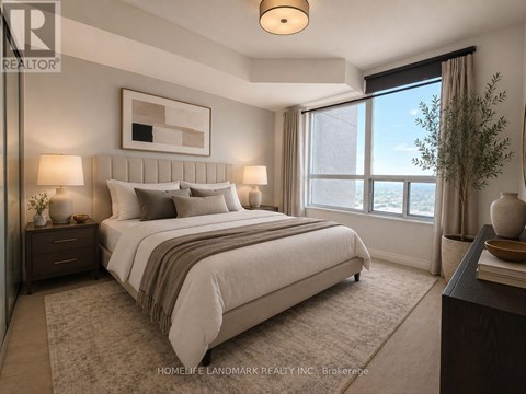 A well-lit bedroom with a large bed and a view of the city.