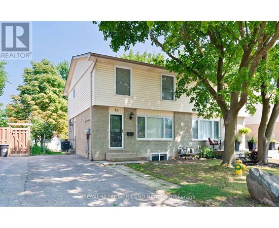 A two-story house with a garage is for sale.