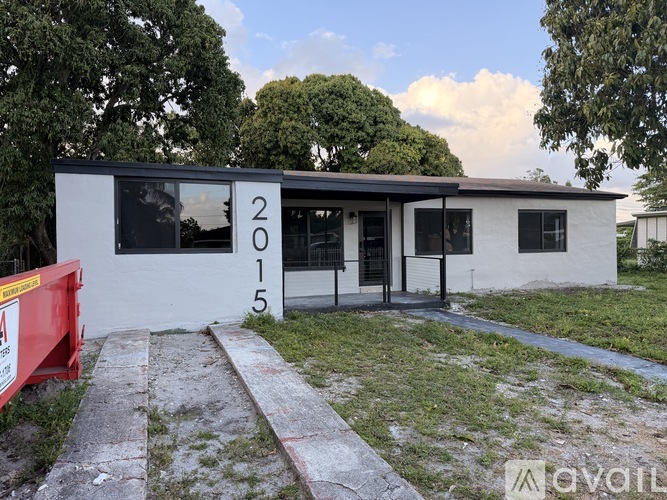 A white building with the number 2015 on it.