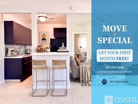 A kitchen and living room with a sign offering a free first month.