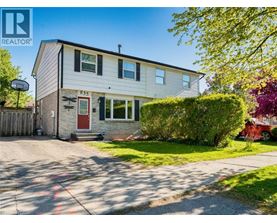 A house with the number 835 on it is for sale.