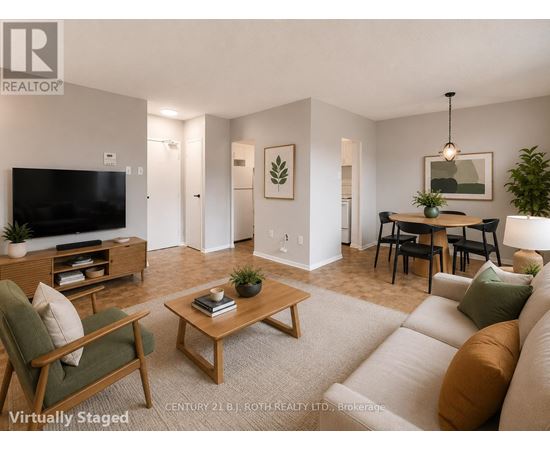 A living room with a couch, chair, and coffee table.