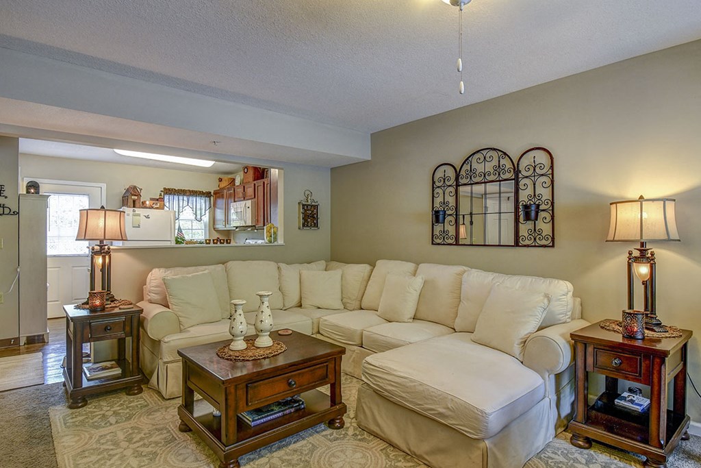 a living room with a couch and a table