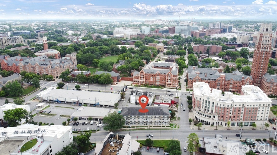 A cityscape with a mix of residential and commercial buildings.