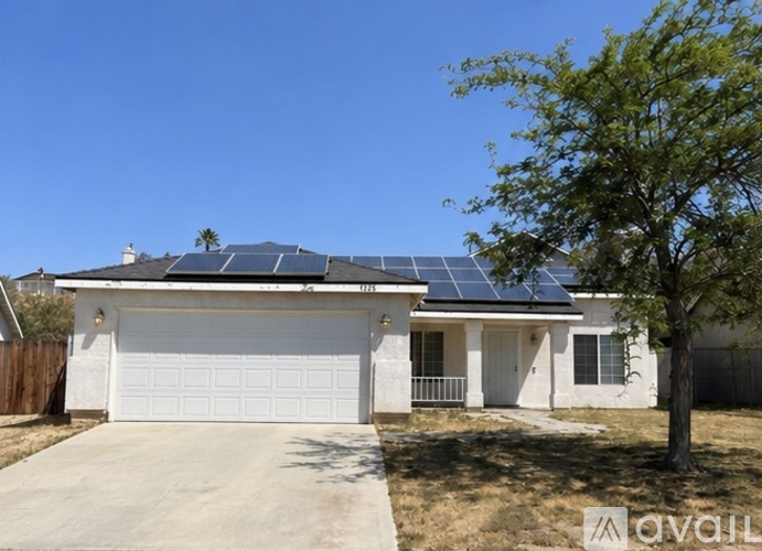 A house with solar panels on the roof.