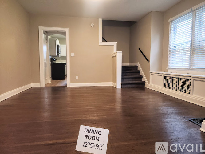 A room with a sign that says Dining Room.