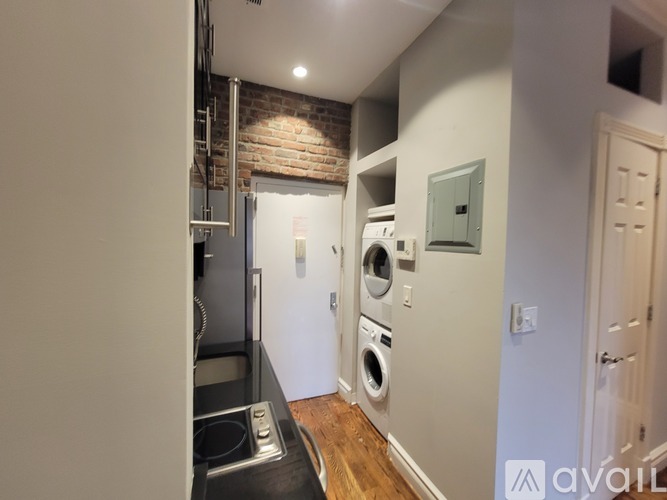 A laundry room with a washer and dryer.