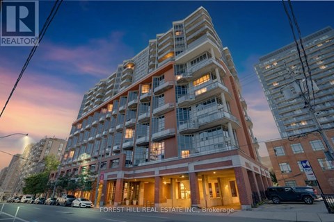 A multi-story building with the text "FOREST HILL REAL ESTATE INC., Brokerage" on the front.