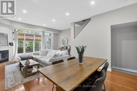 A modern living room with a wooden table and a couch.