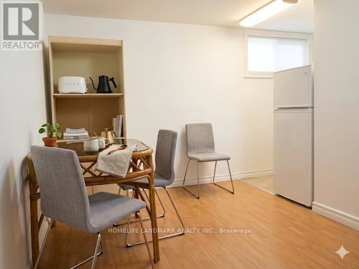 A small room with a table and chairs.