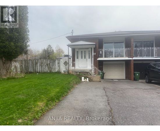A house with a white door and a balcony is for sale.