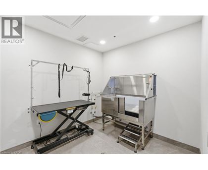 A clean room with a table and a machine.
