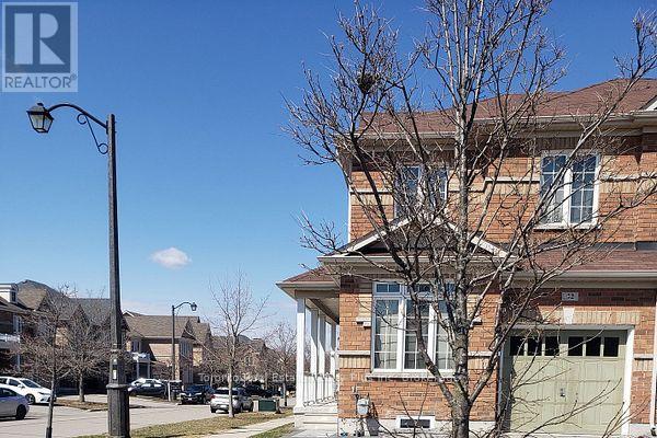 A house with a sign that says REALTOR on the top left corner.