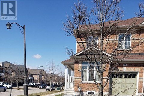 A house with a sign that says REALTOR on the top left corner.