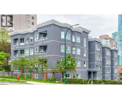 A grey building with a sign that says REALTOR.