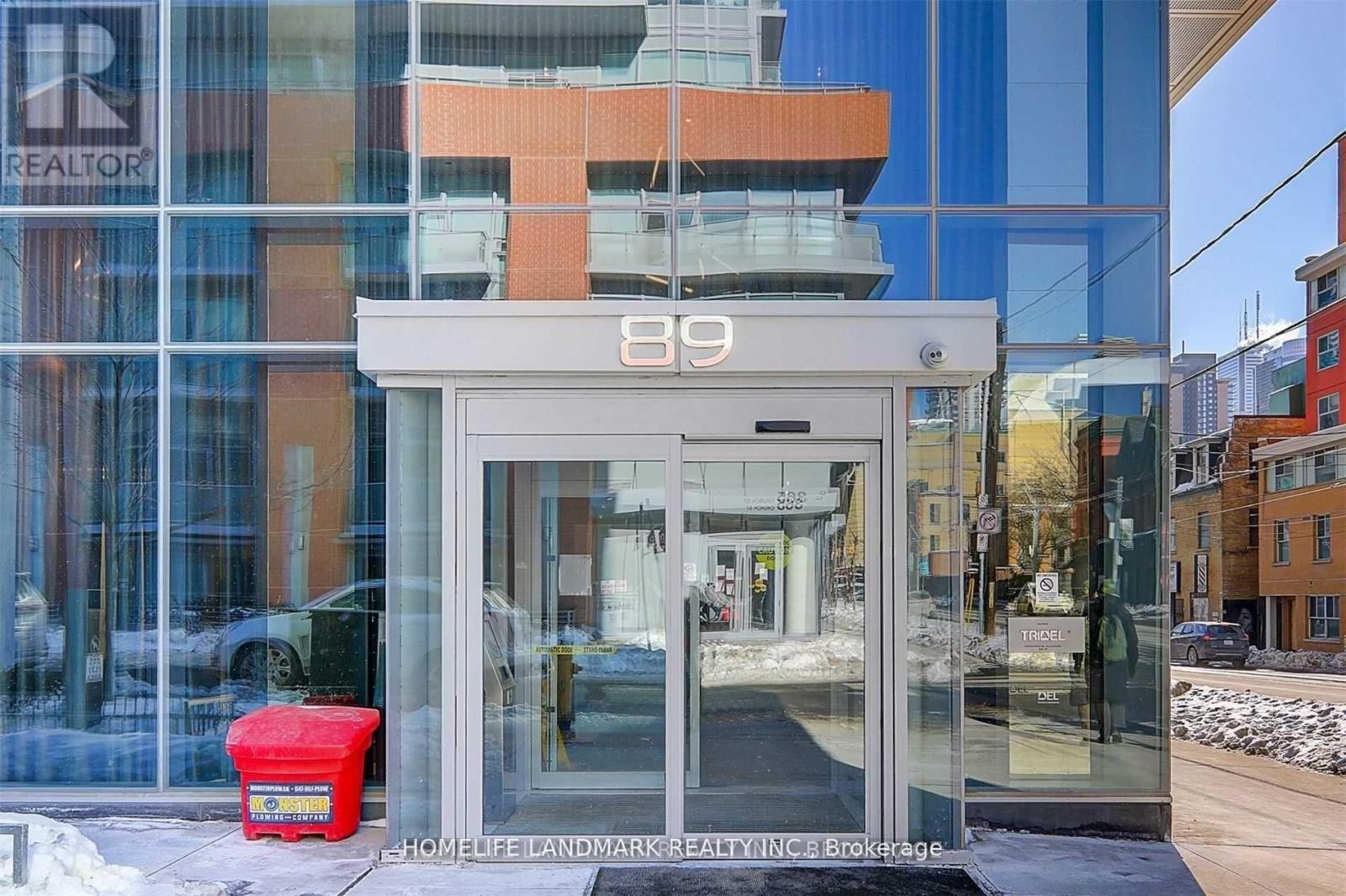 The entrance to a building with the number 89 on it.