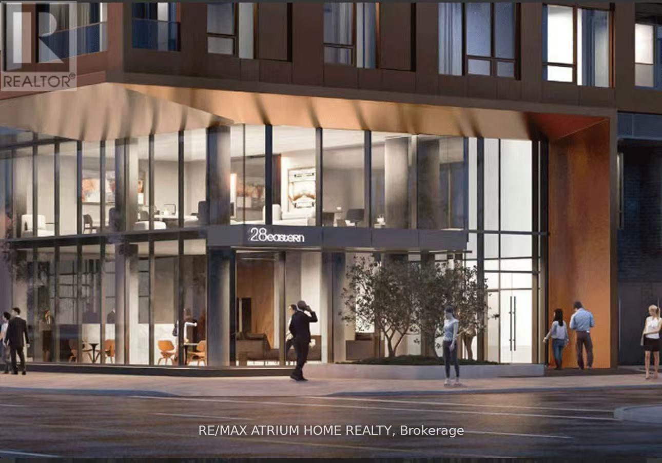 A modern building with the sign RE/MAX Atrium Home Realty, Brokerage on the front.