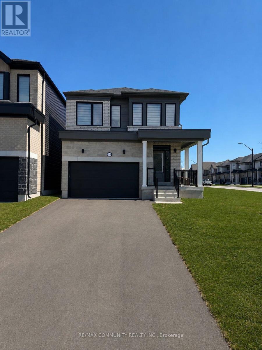 A modern two-story house with a garage is for sale.