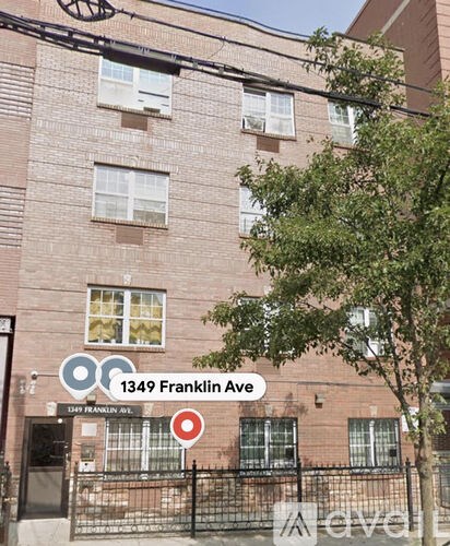 A brick building with the number 1349 on it.