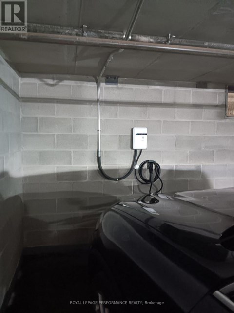 A white electrical outlet on a wall.
