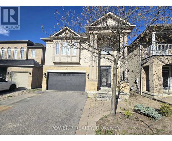 A house with a garage is for sale.