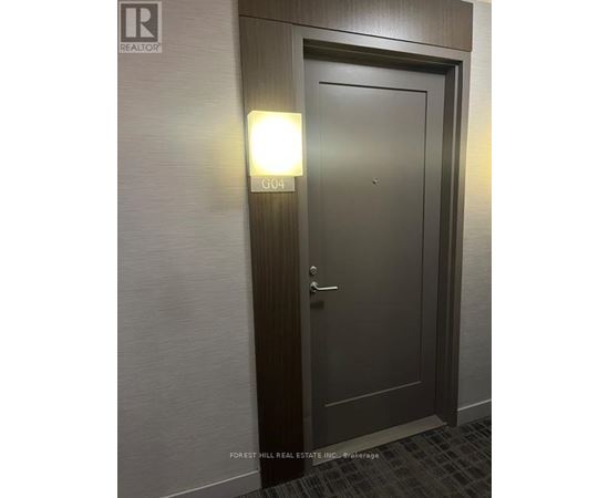 A door with a sign that says G04 on it.