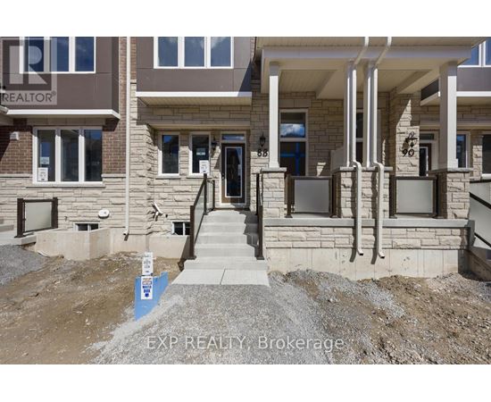 A house under construction with a sign that says EXP REALTY Brokerage.