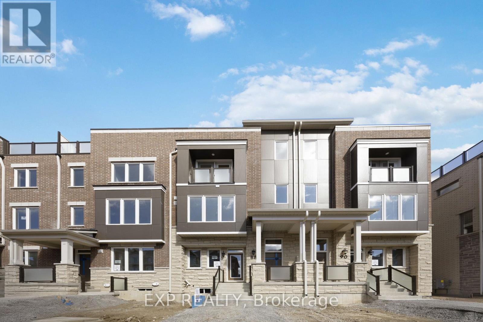 A building with the words EXP REALTY Brokerage on the front.